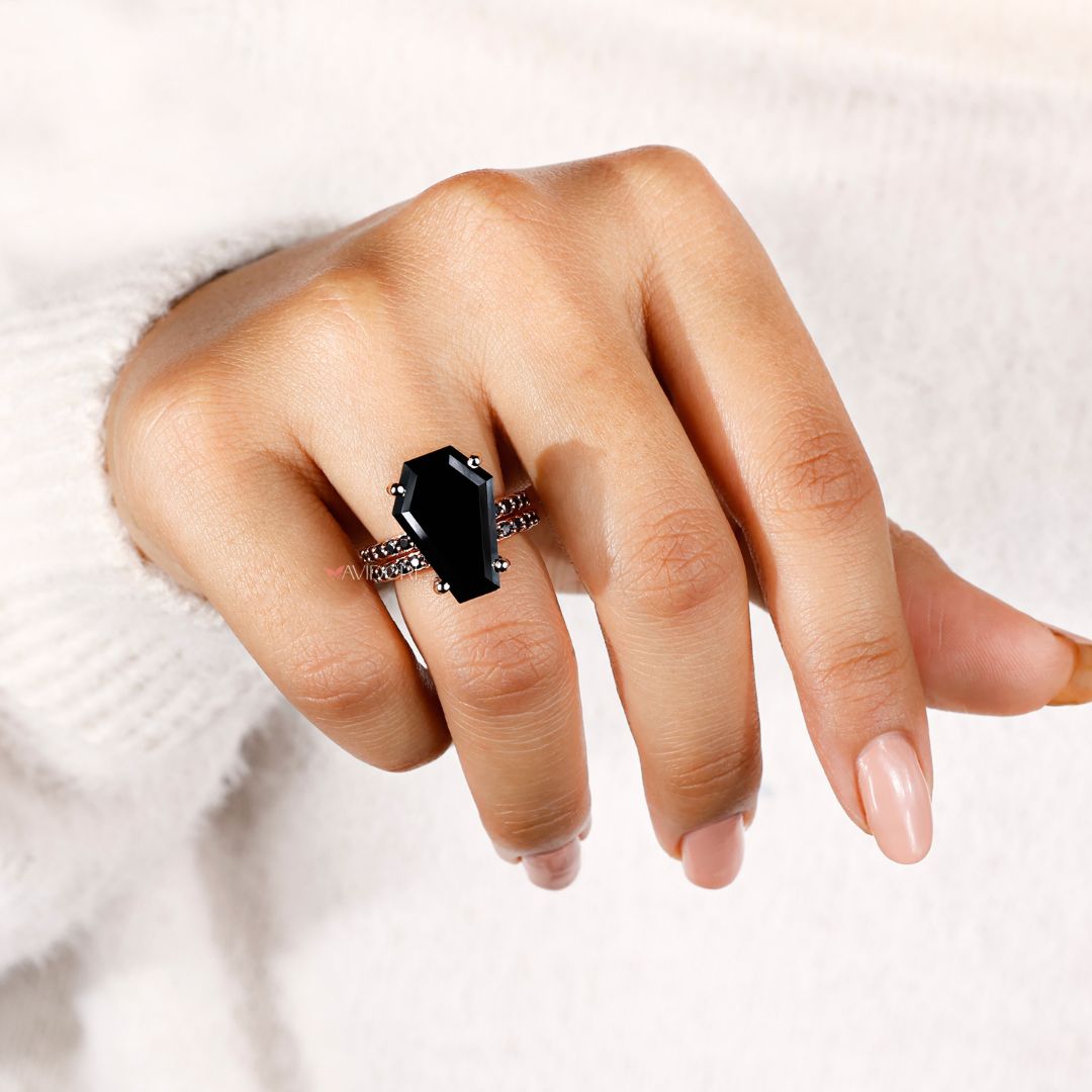 Avideri ring with a striking black moissanite coffin design.
