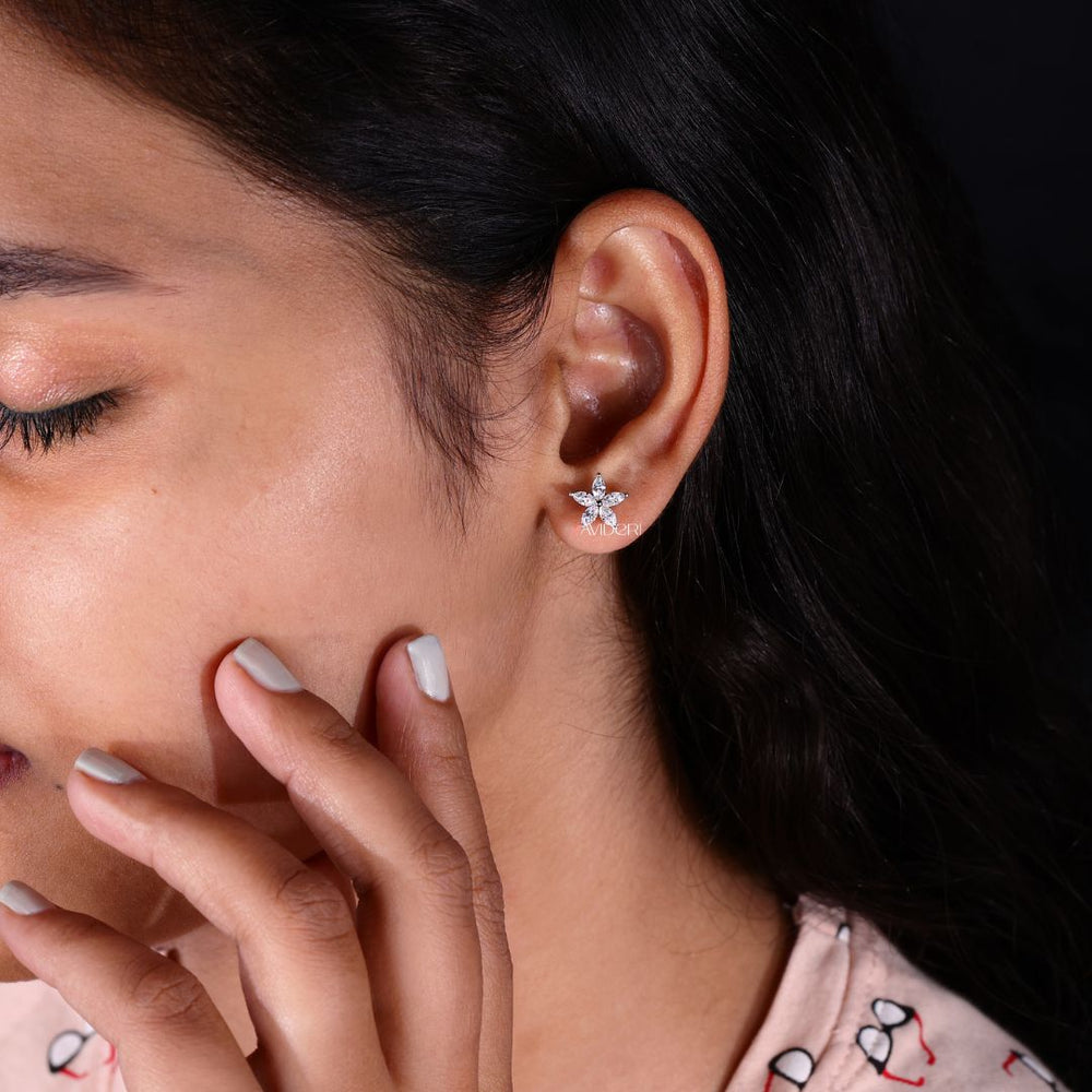 Stunning Marquise Moissanite earrings with flower stud design.