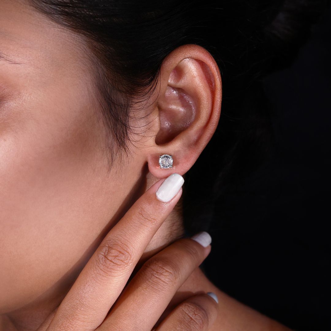 Moissanite white gold earrings shine with lasting brilliance.