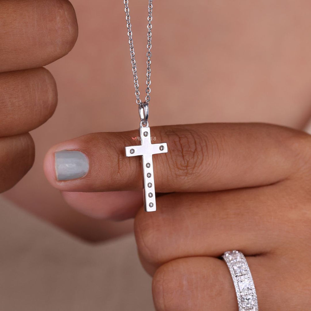 White gold cross pendant with a sleek polished finish
