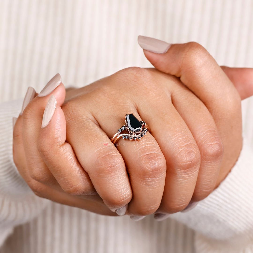 Black onyx engagement ring featuring a bold coffin engagement ring.