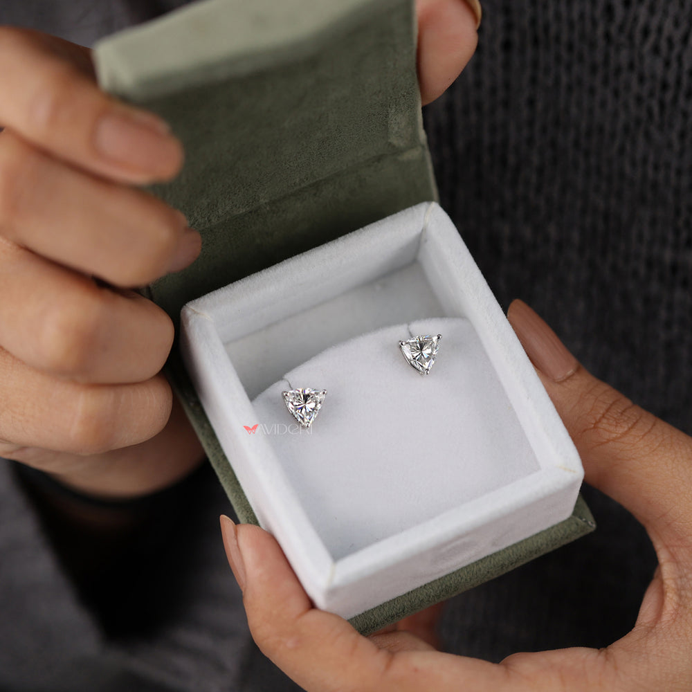 The trillion cut earrings offer a unique and bold design.