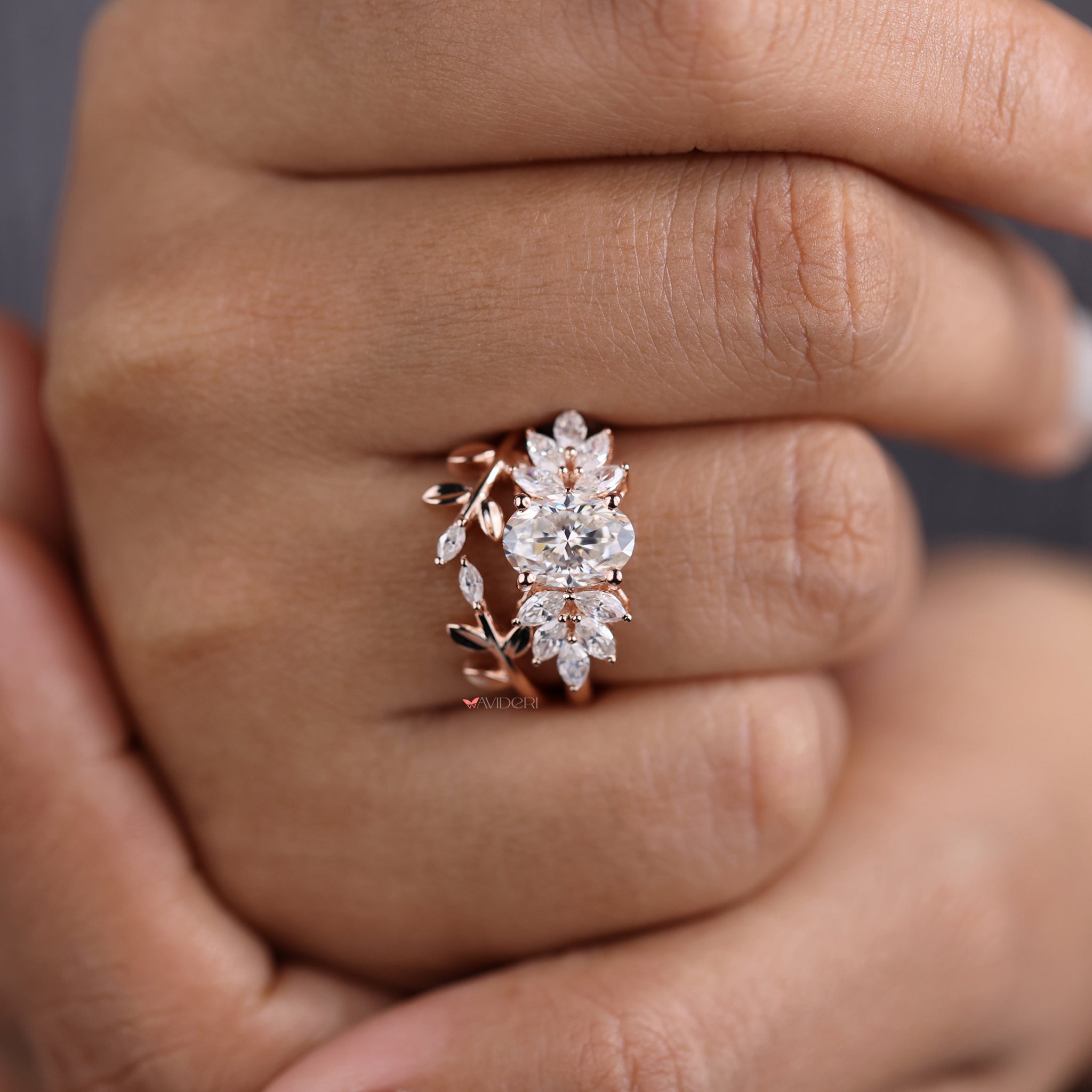 Rose gold bridal sets featuring oval and marquise cut leaf style rings.
