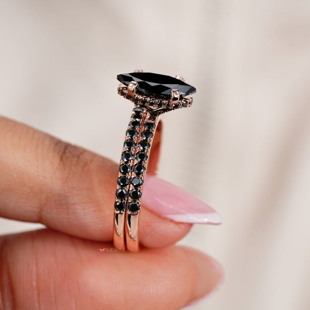 Hidden halo ring with a marquise moissanite centerpiece for a touch of modern glamour.