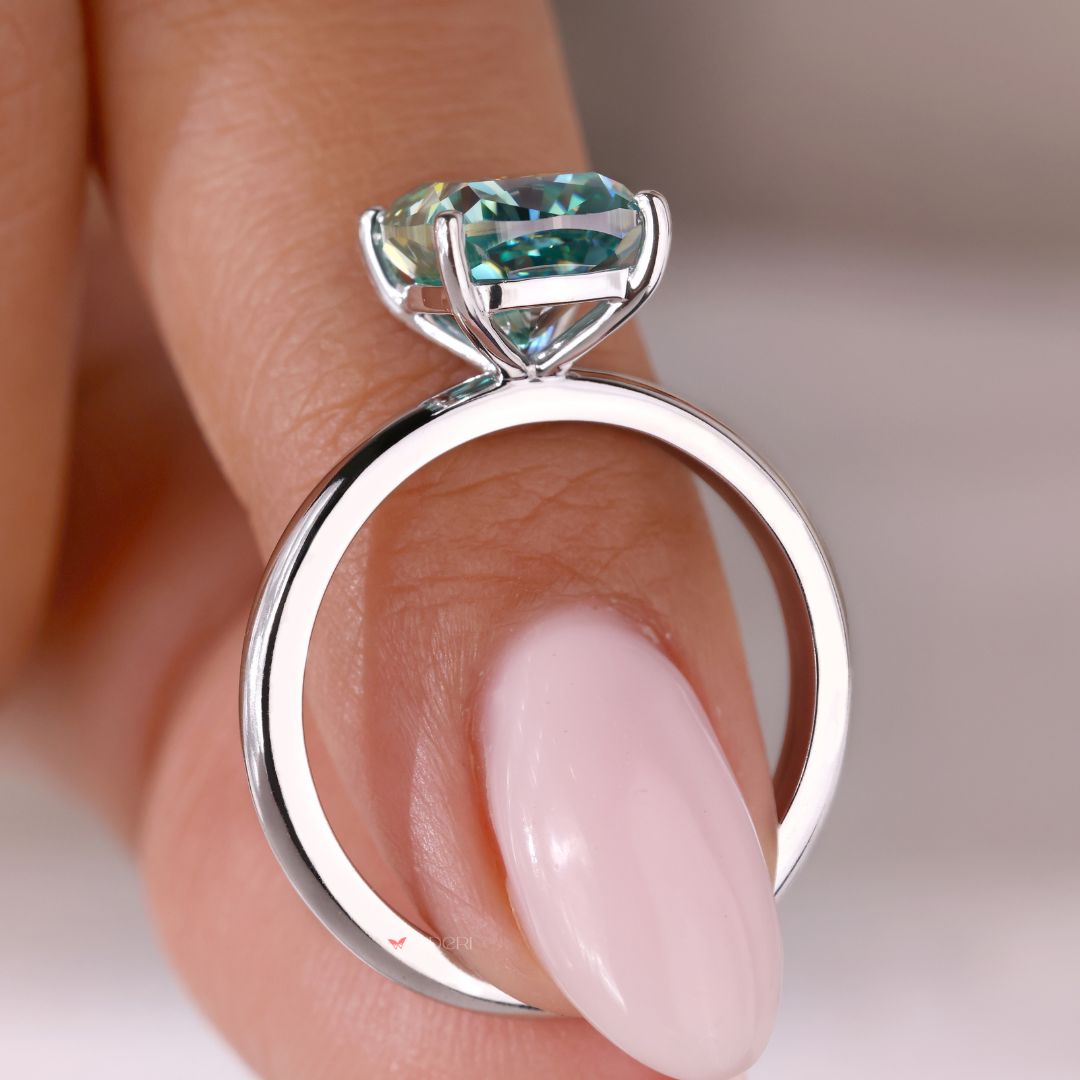 White gold engagement ring featuring a beautiful cushion cut stone.
