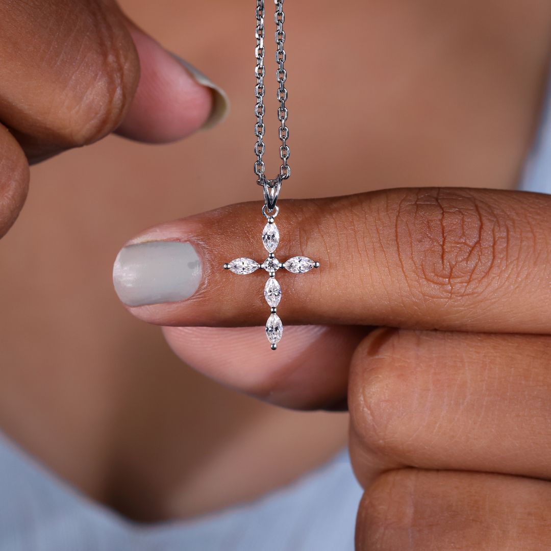 Marquise diamond pendant set in a sleek gold frame
