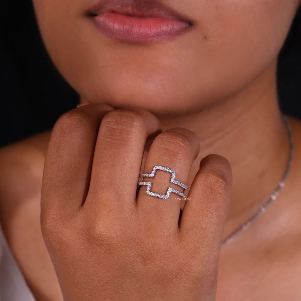 Moissanite wedding band showcases sustainable brilliance with radiant moissanite stones.
