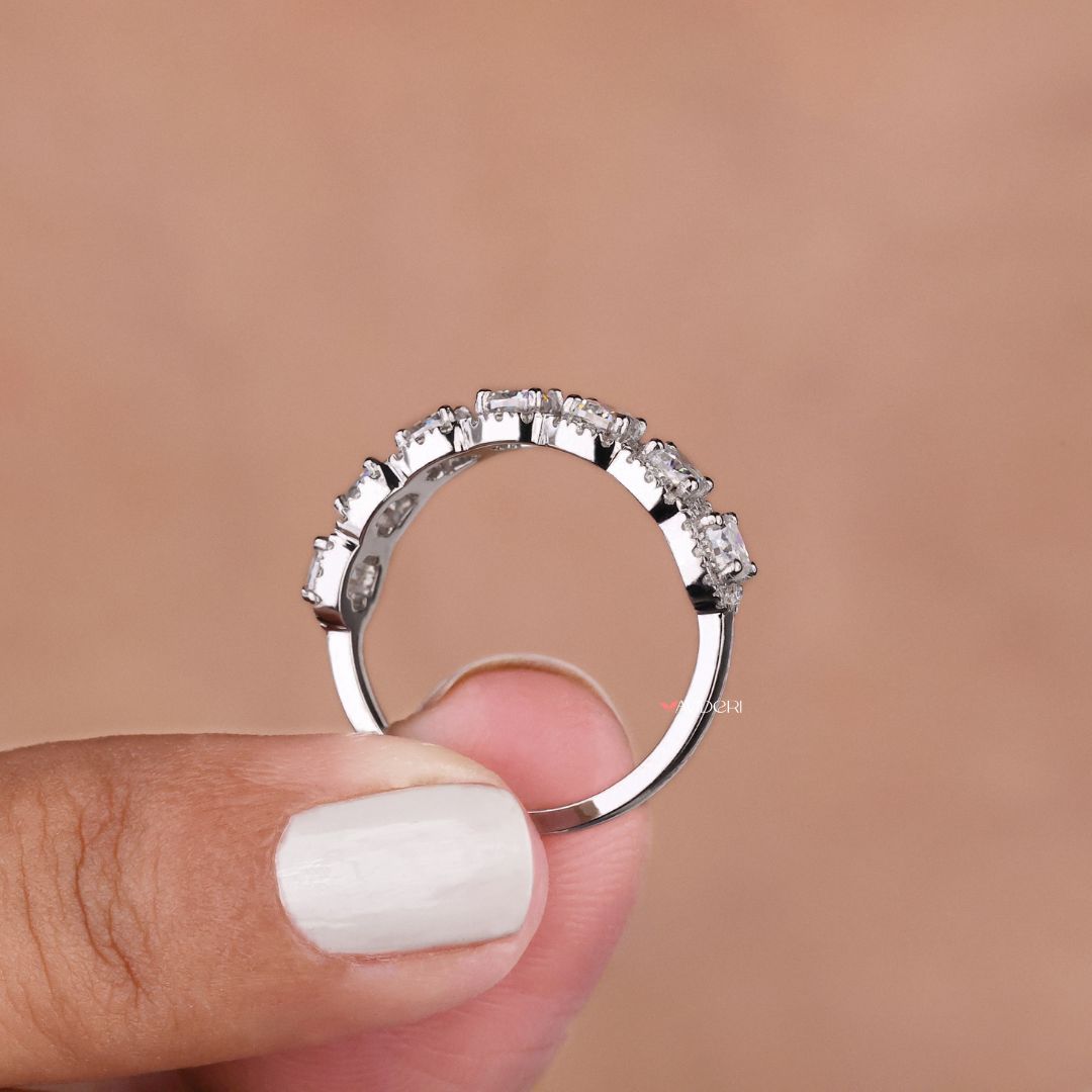 White gold wedding band shines with a polished finish and enduring sophistication.

