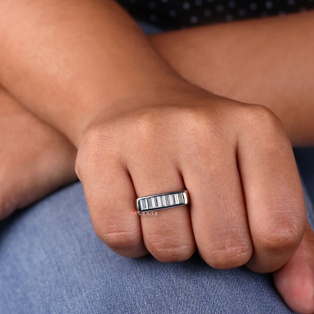 Baguette wedding band highlights clean lines with stunning baguette moissanite stones.
