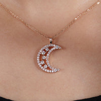 Half Moon Pendant With Round Moissanite In Rose Gold