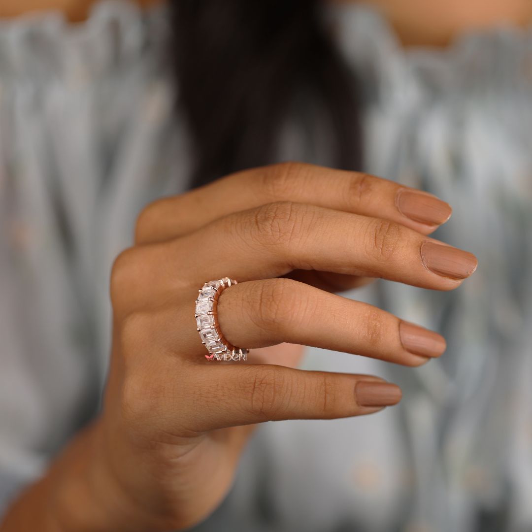 Eternity wedding band features full-circle brilliance with elegant design.
