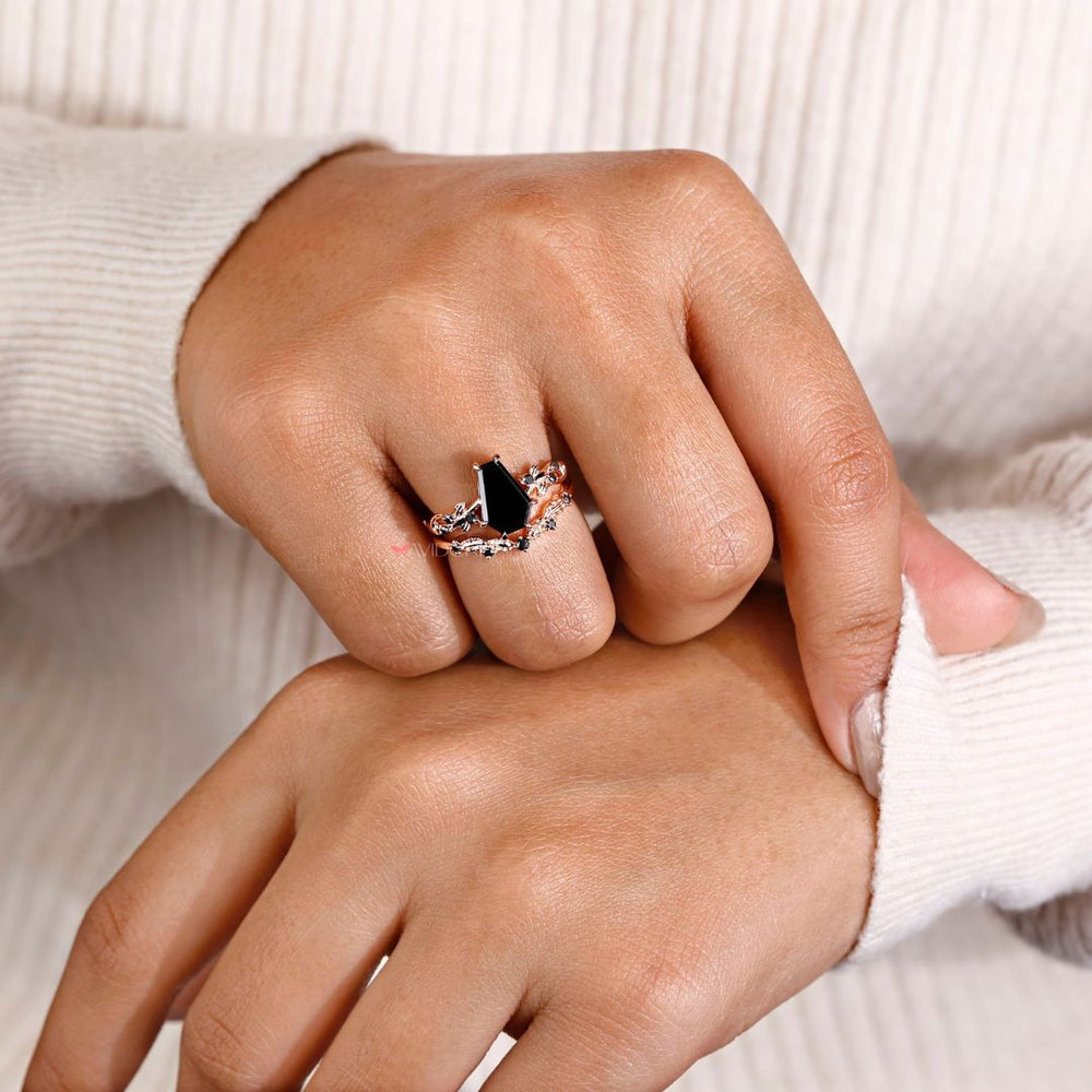 Coffin engagement ring with antique filigree ring details for elegance.