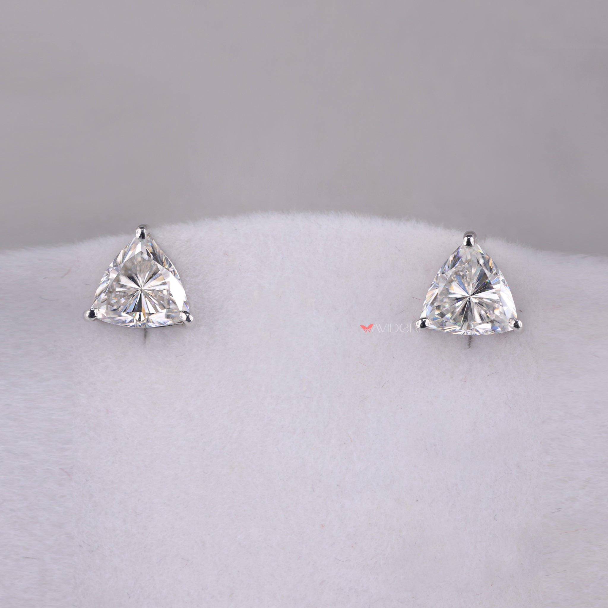 Trillion cut earrings feature sharp angles for a striking look.