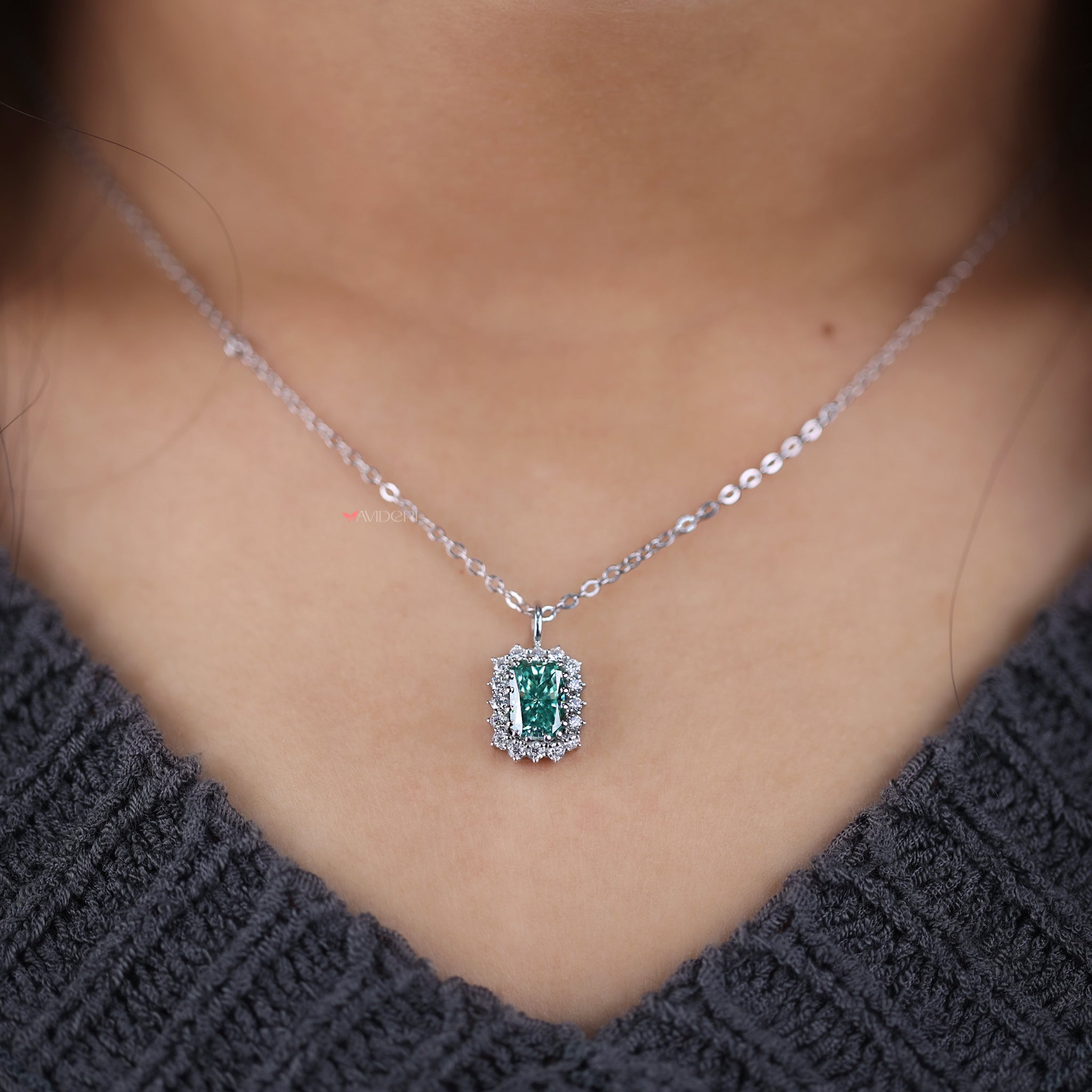 Radiant and round cut pendant blends two distinct styles for a unique look.