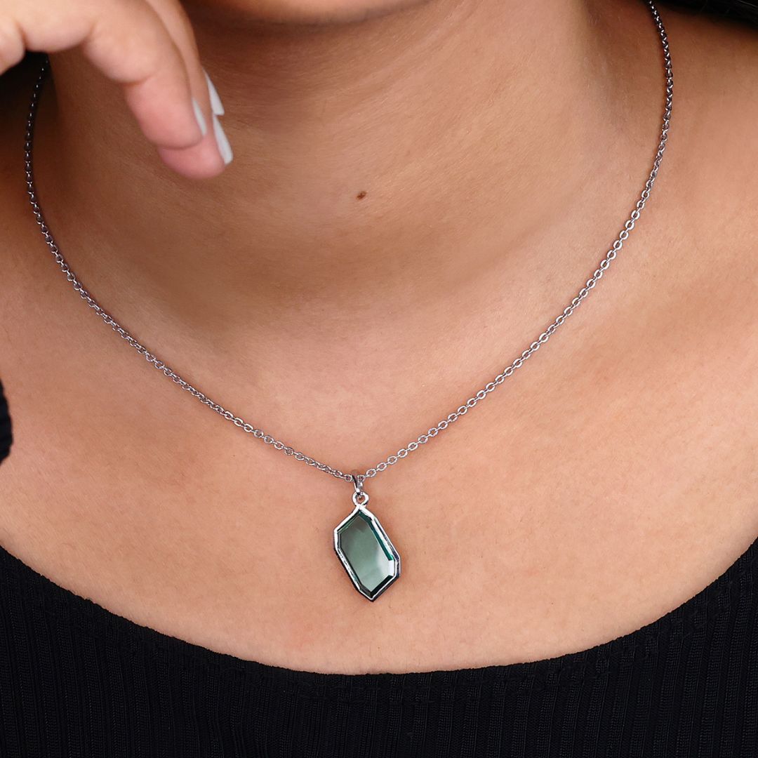 White gold pendant with a refined design.