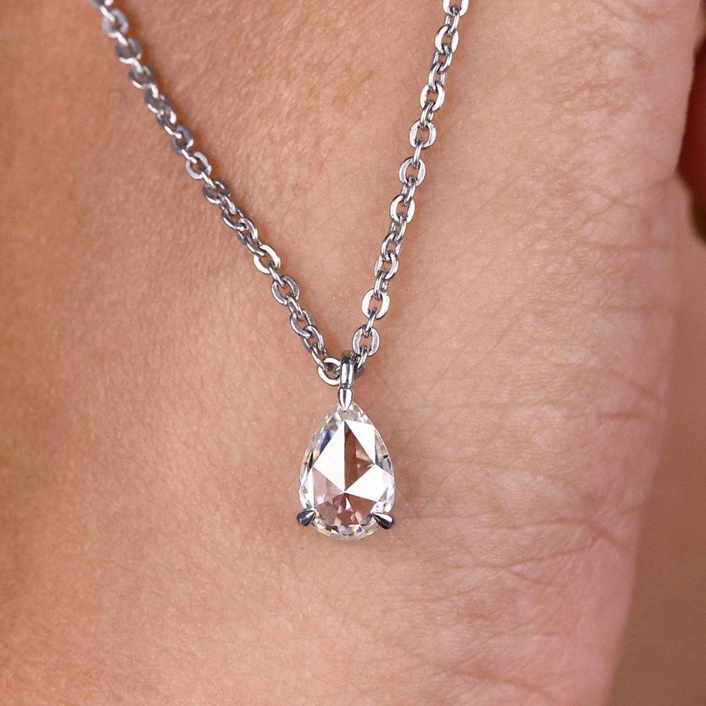 Pear rose cut pendant designed to add a unique touch to any jewelry collection, perfect for special occasions.