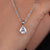 Trillion cut pendant with a sleek, geometric design, perfect for a modern and stylish look.
