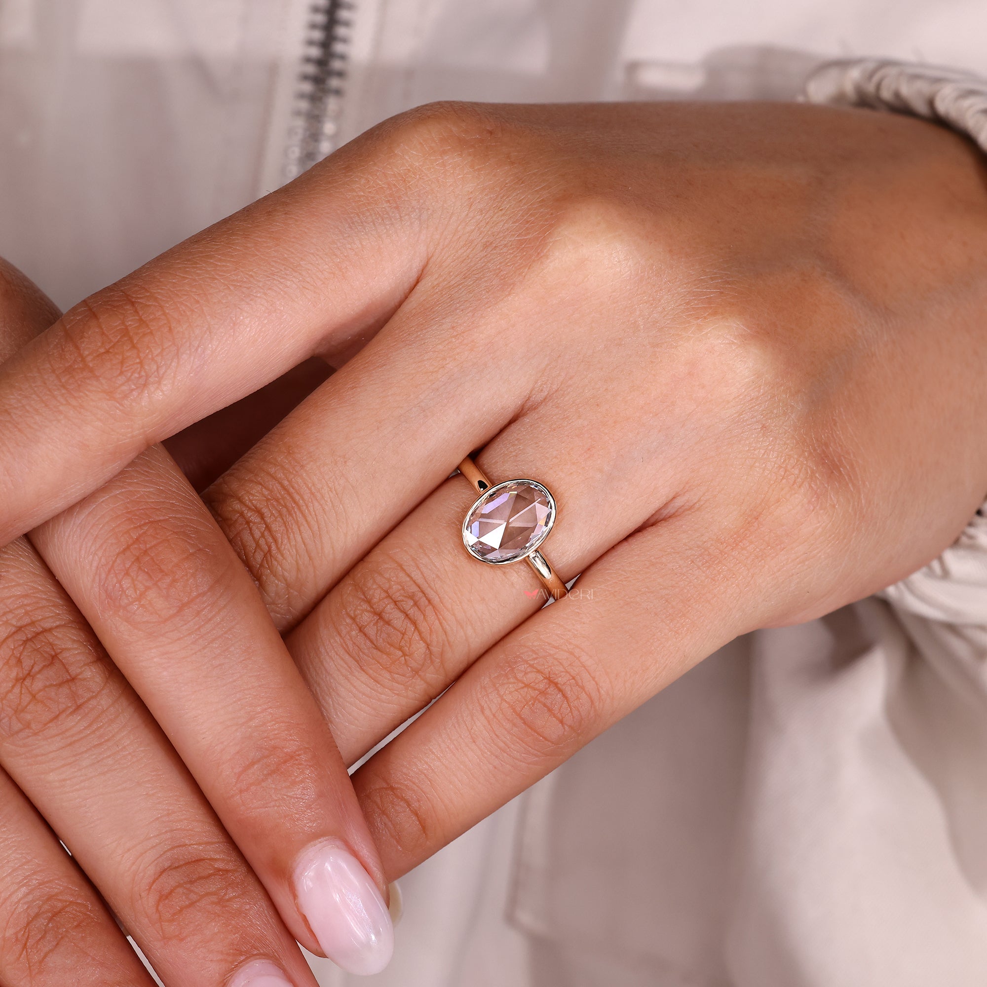 Lab grown bezel set oval rose cut diamond ring.
