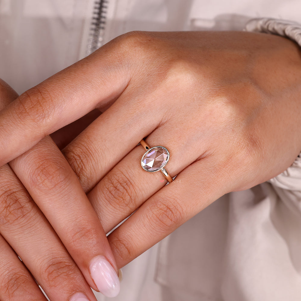 Lab grown bezel set oval rose cut diamond ring.
