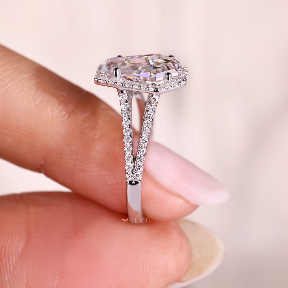 Coffin cut diamond ring with bridge detail.