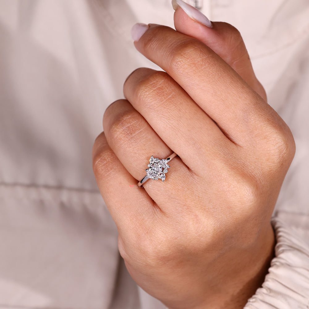 Oval cut diamond ring in modern east west style.
