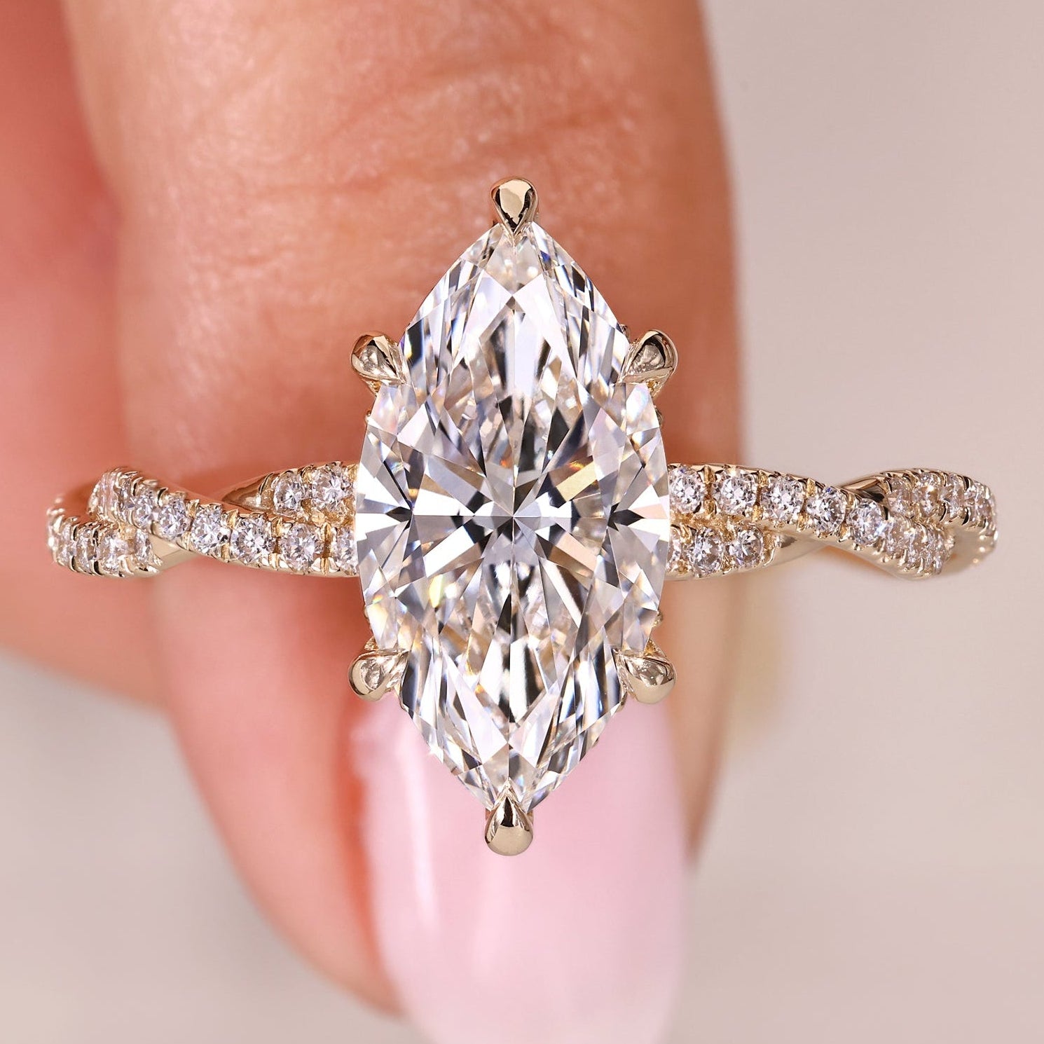 Marquise Cut Diamond Ring with Round Diamond Twisted Pave Style Band