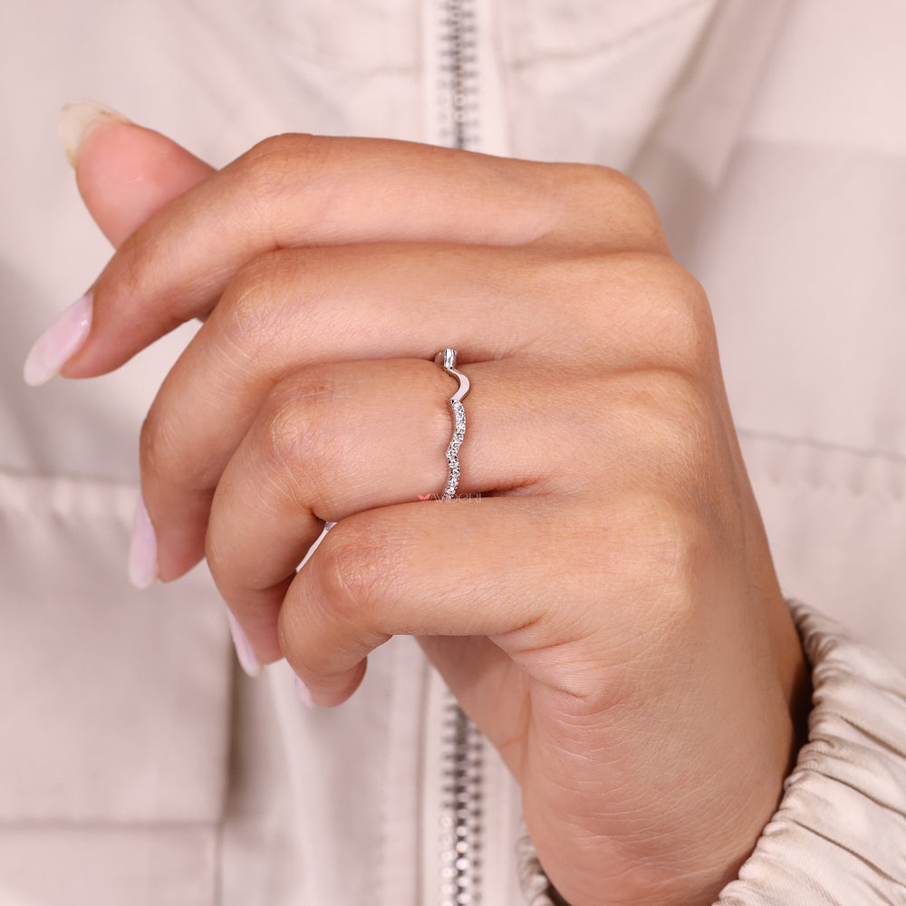 Handmade curved diamond band in half eternity style.
