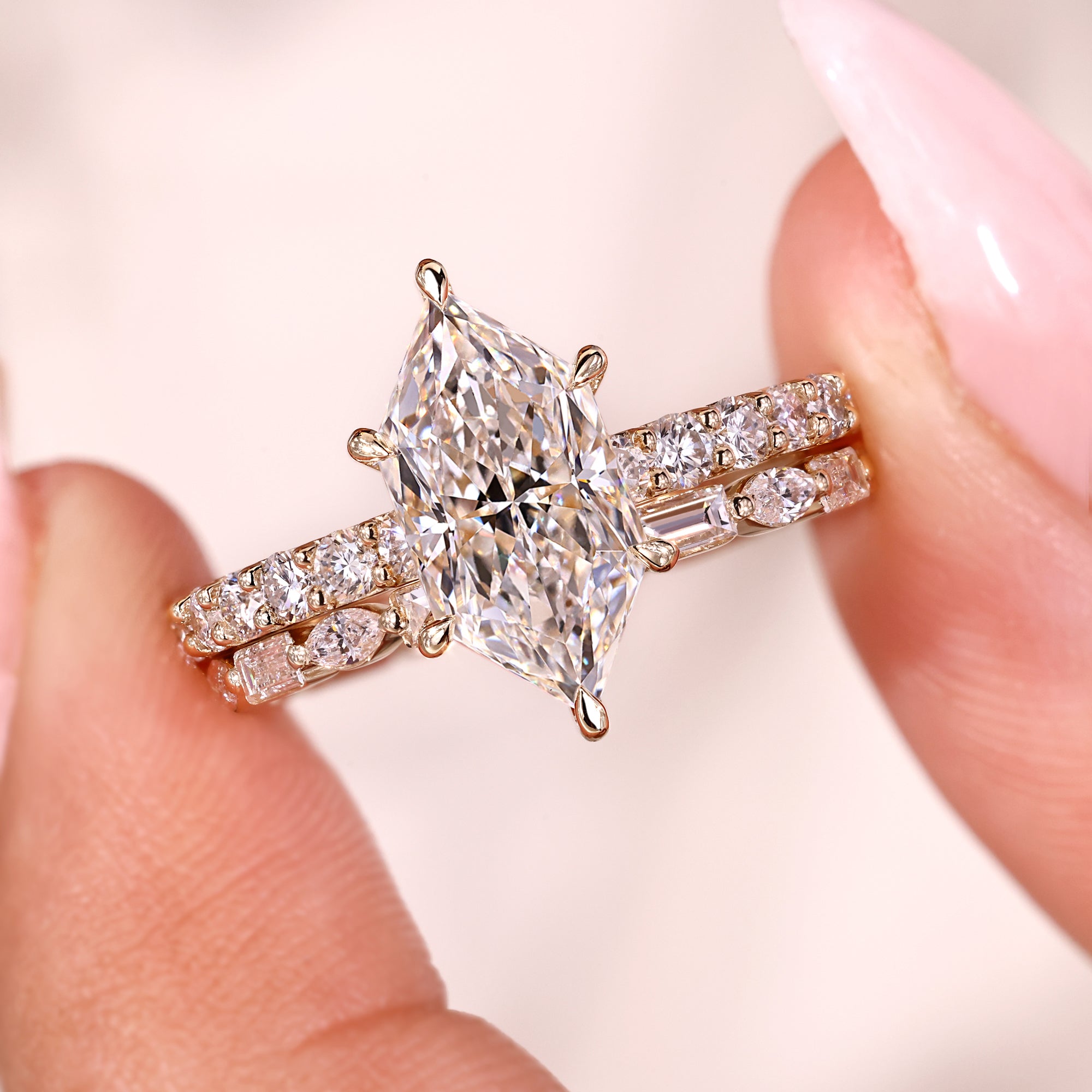 Shared prong setting with baguette and marquise wedding band.