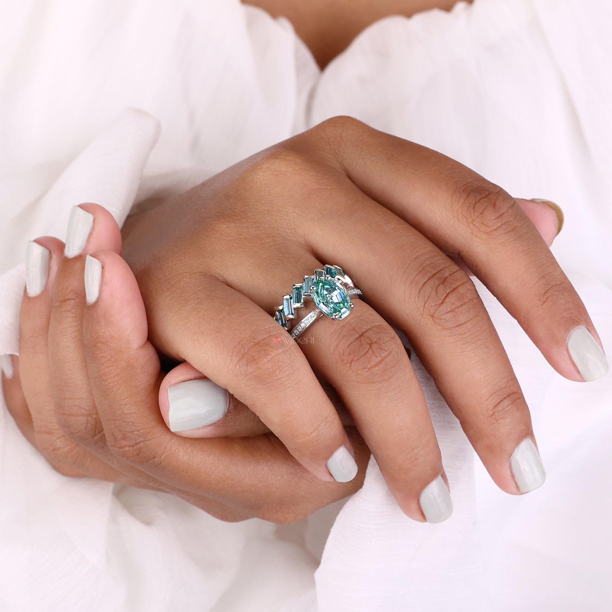 Baguette Cut Wedding Band pairing beautifully with the Oval Cut Engagement Ring.