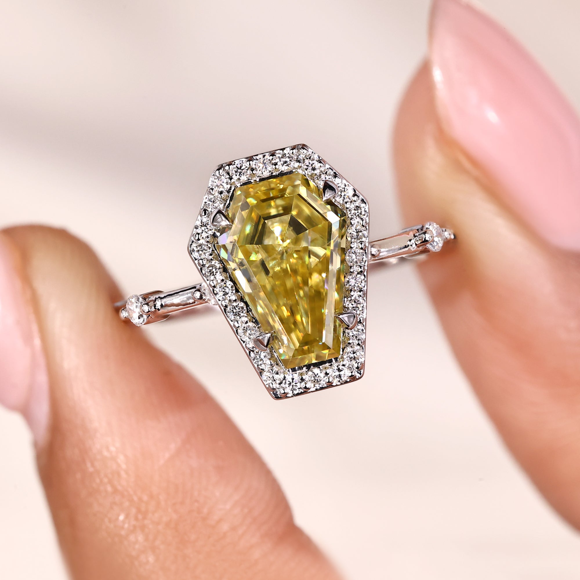 Avideri engagement ring with coffin cut engagement ring.