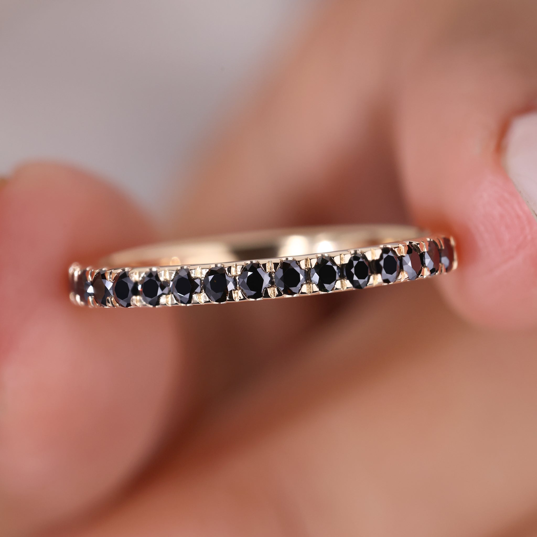 Round eternity band featuring a round cut wedding band design.
