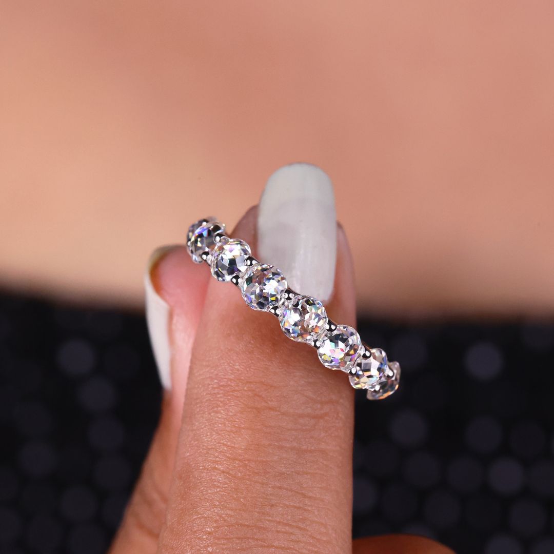 Round rose cut wedding band features soft brilliance with a vintage-inspired design.
