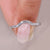 Baguette diamond band in curved bar setting.
