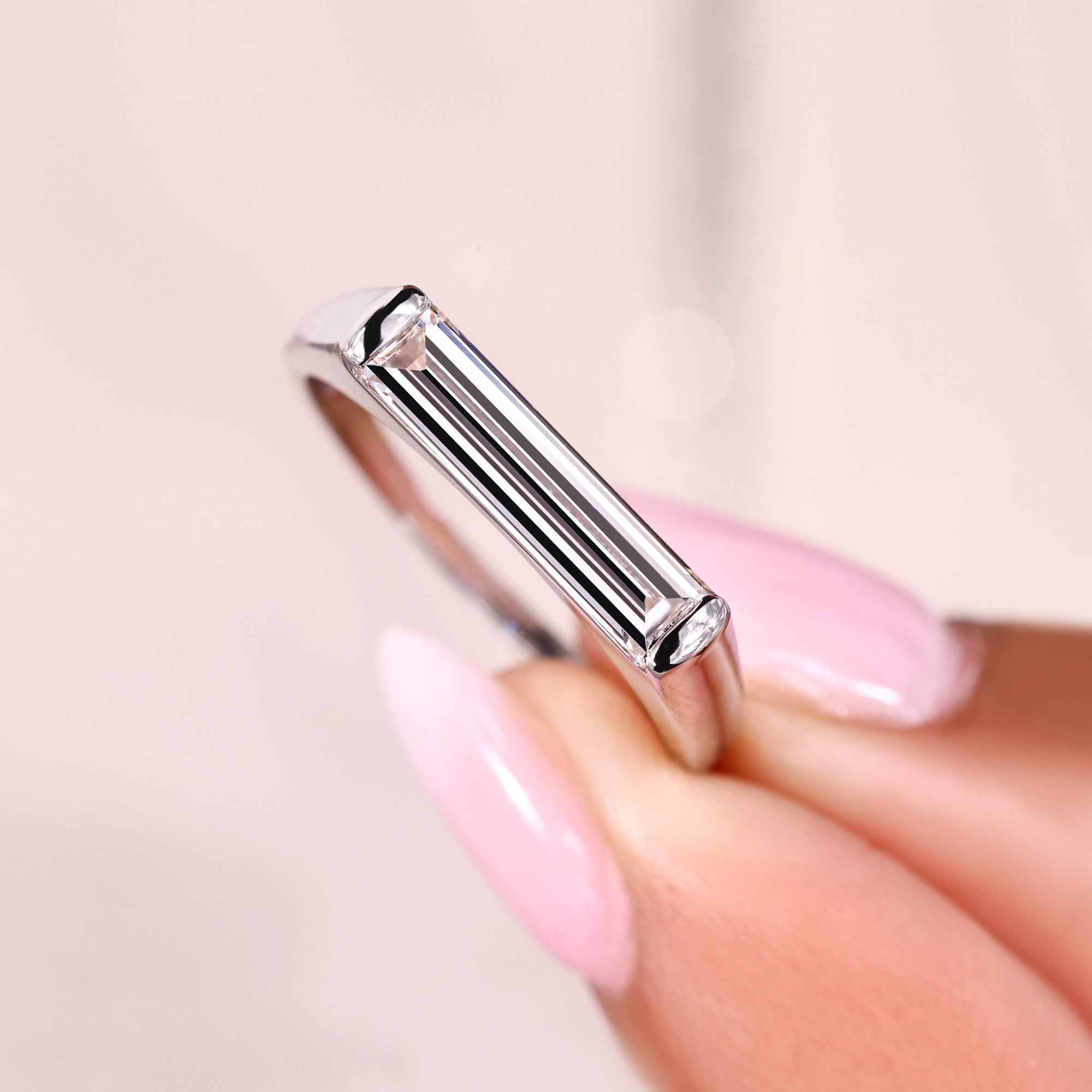 Baguette diamond engagement ring in white gold setting.