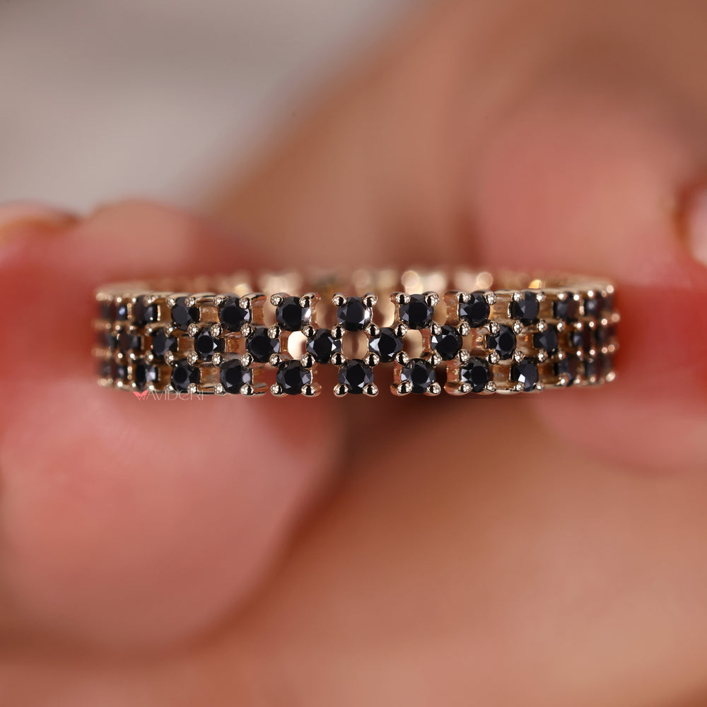 The three-row pave band offers continuous sparkle and shine.