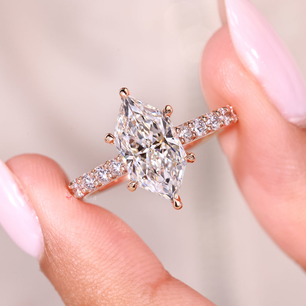 Marquise ring with hidden halo and round stones.
