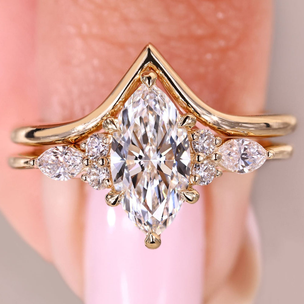 Marquise diamond ring with Chevron wedding band.
