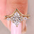 Marquise diamond ring with Chevron wedding band.
