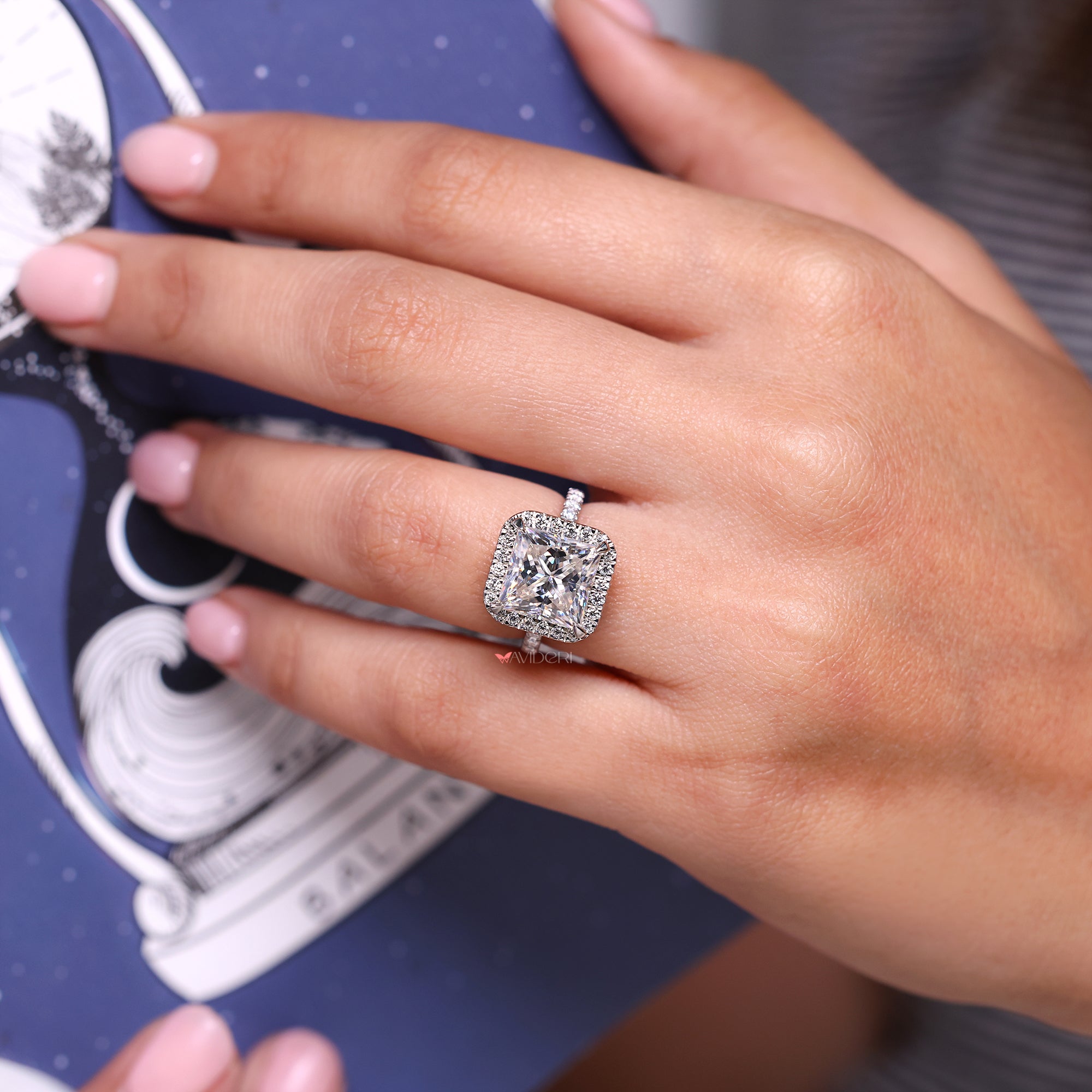 Four claw prong on pave setting ring.