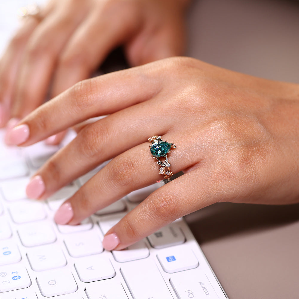 Green stone engagement ring with Buy a Moissanite ring.