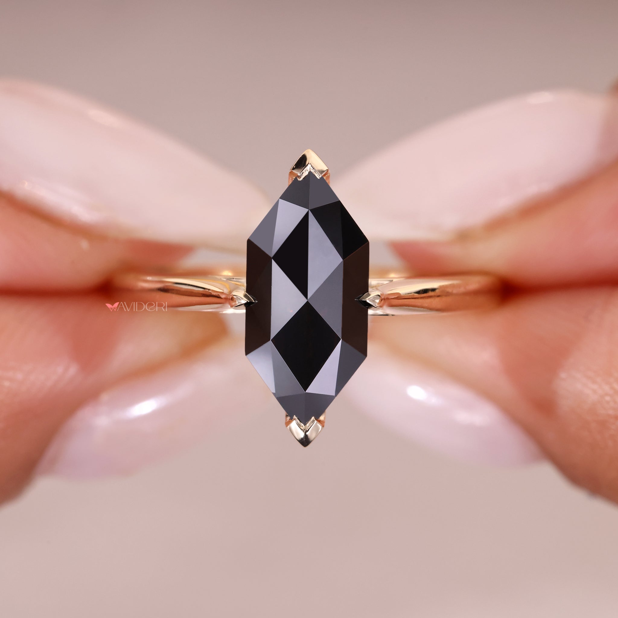 A simple solitaire ring showcasing a brilliant moissanite gem.
