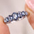 Claw prong setting with white gold wedding band.