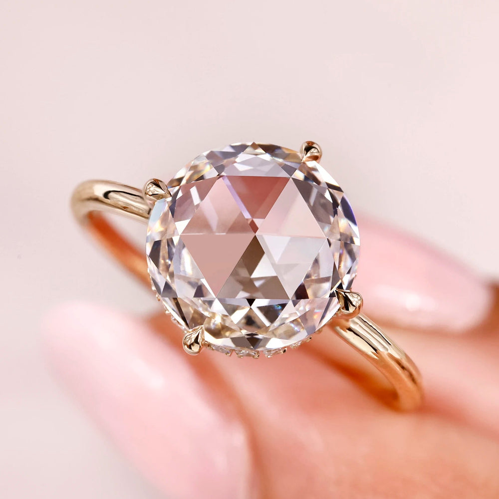 Round rose cut engagement ring with open gallery ring.