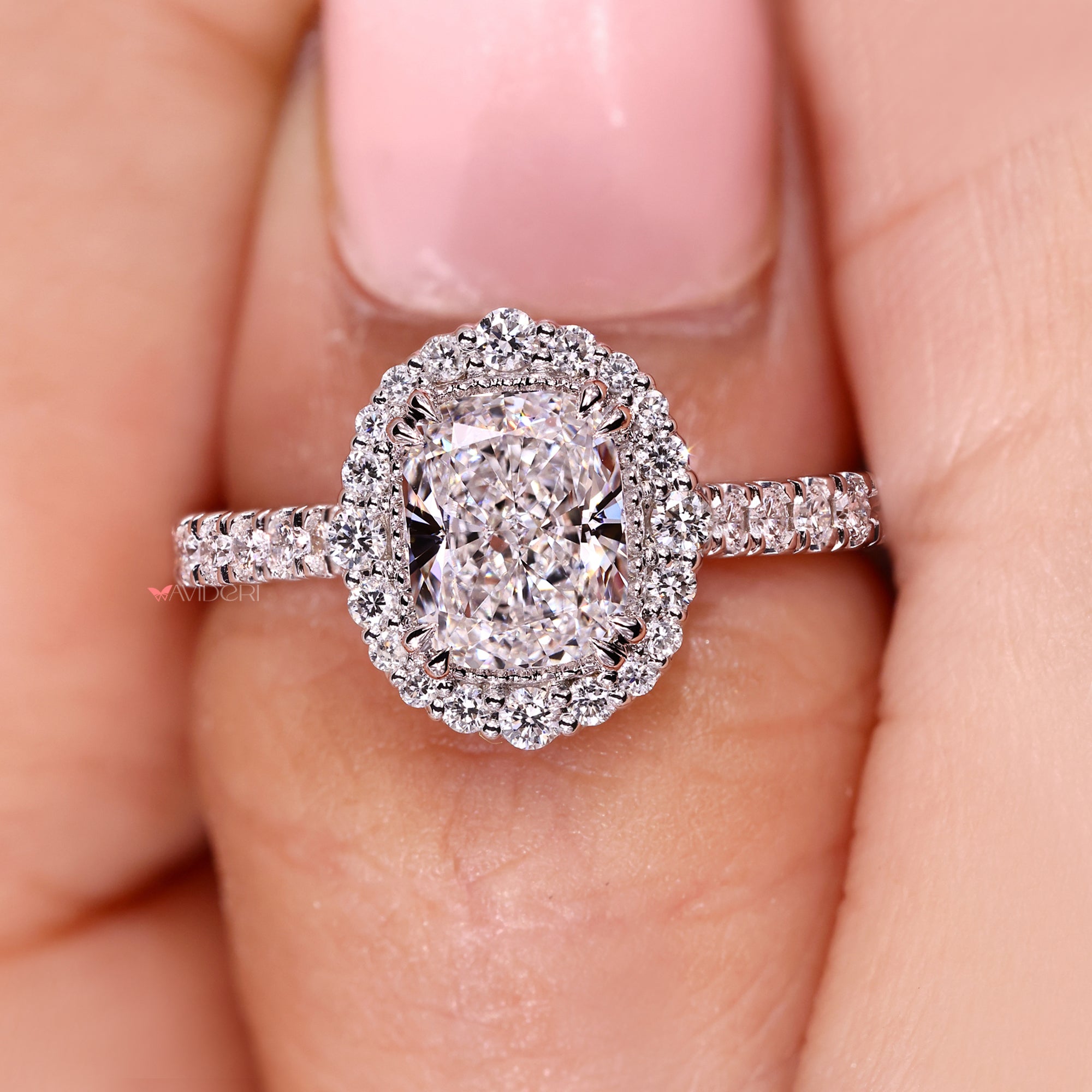 Cushion diamond engagement ring with halo engagement ring.