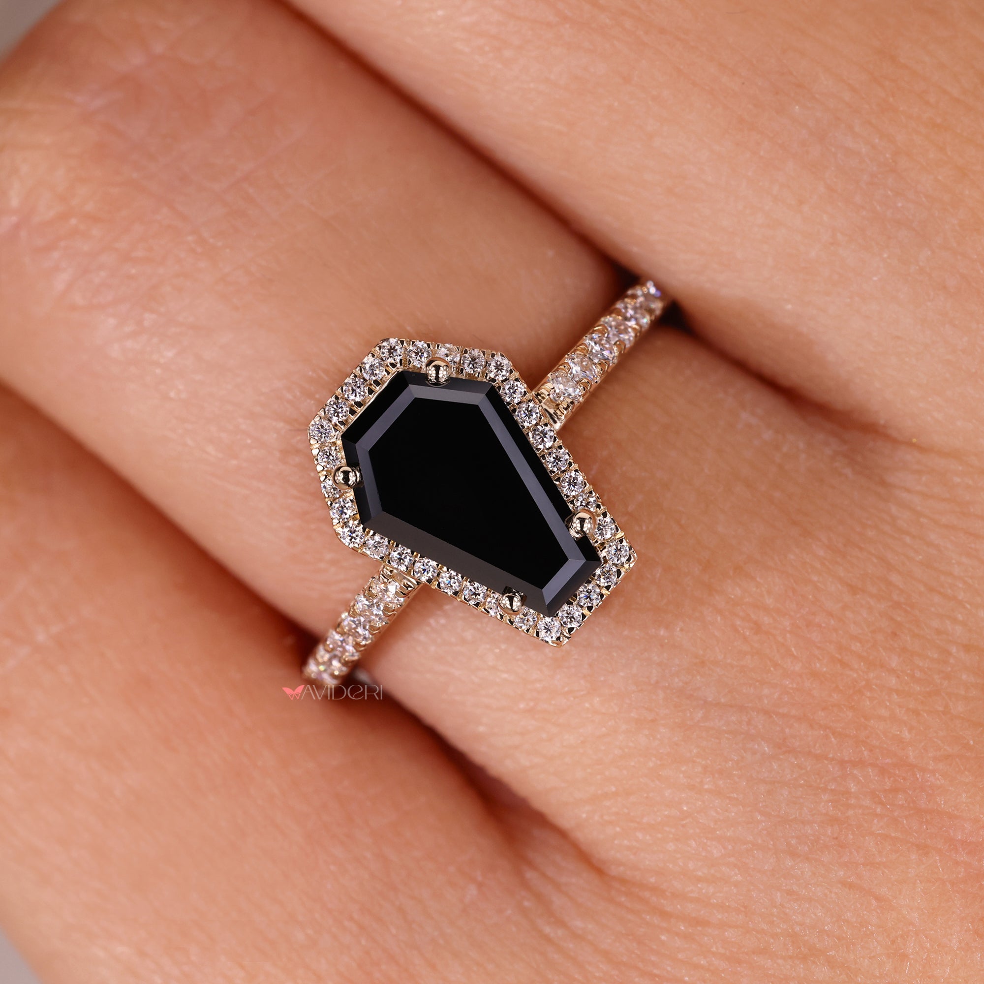 Black coffin cut ring and halo setting ring.