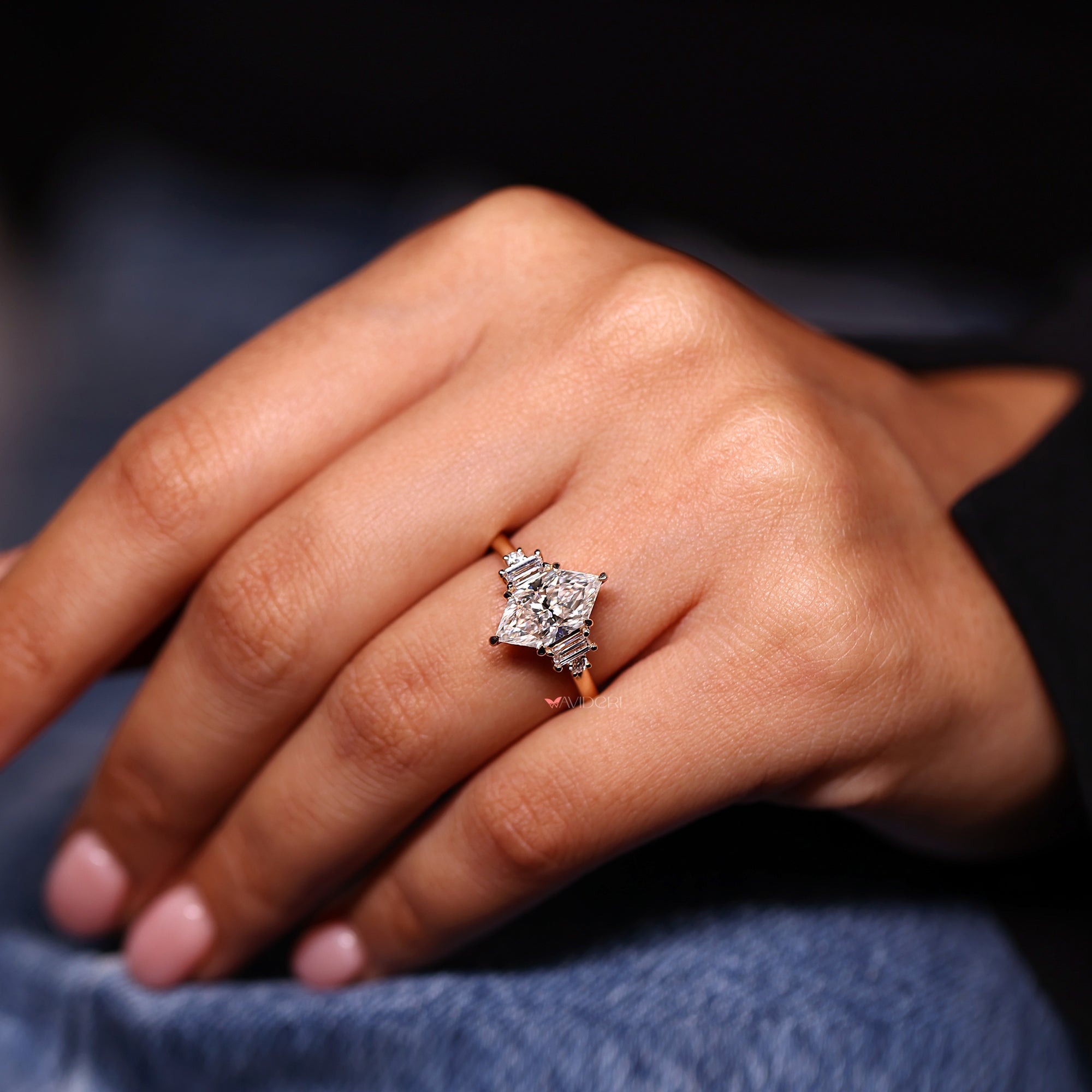 Five stone ring in yellow gold engagement ring design.