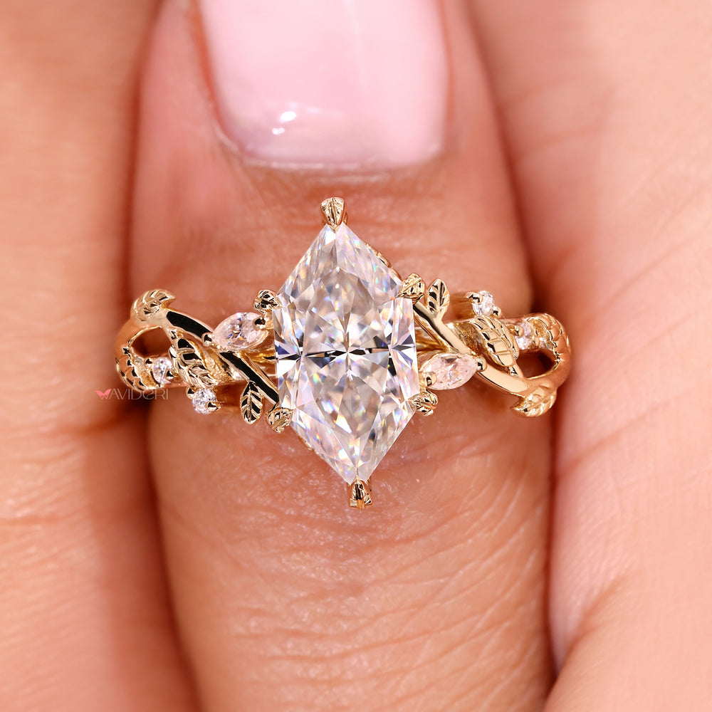 Avideri ring with a marquise center stone.