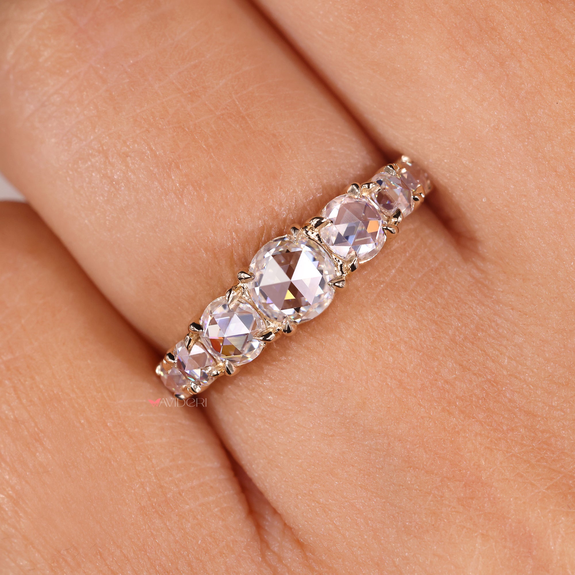 Avideri wedding band brings shine with a bold finish.
