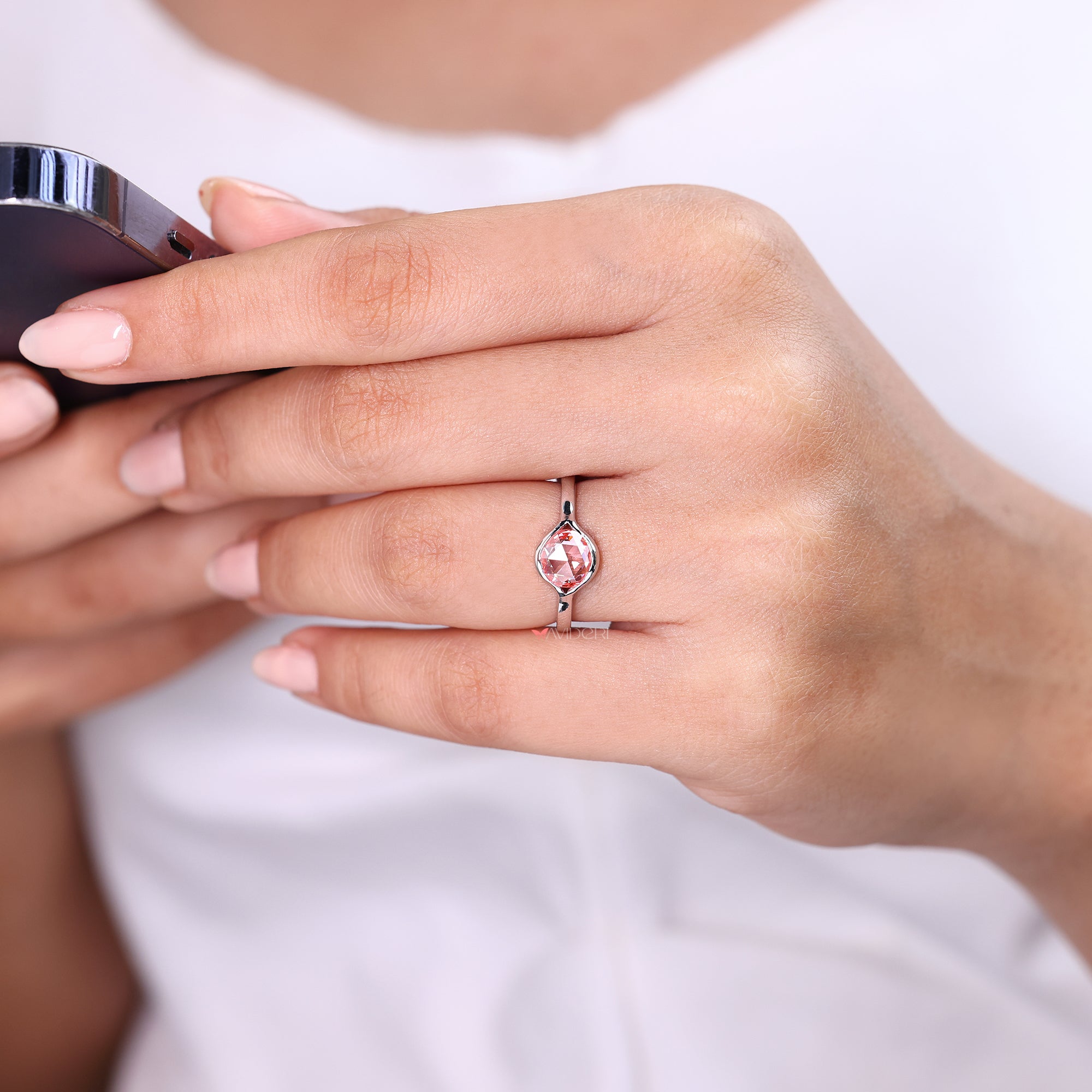 Round rose cut diamond ring with pink round rose cut diamond.