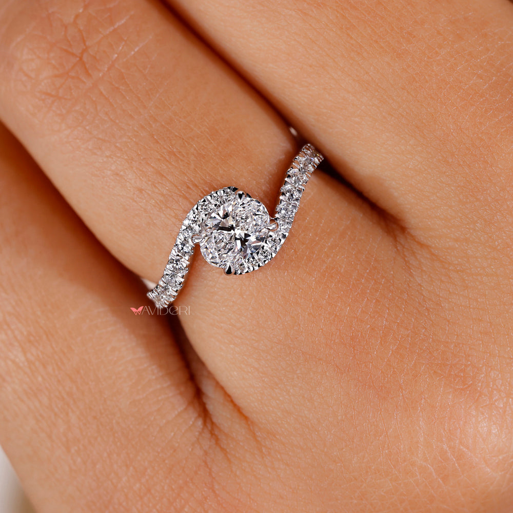 East west engagement ring with a unique twist on classic designs.